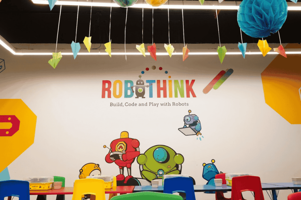 Child building a robotics project at RoboThink Riyadh